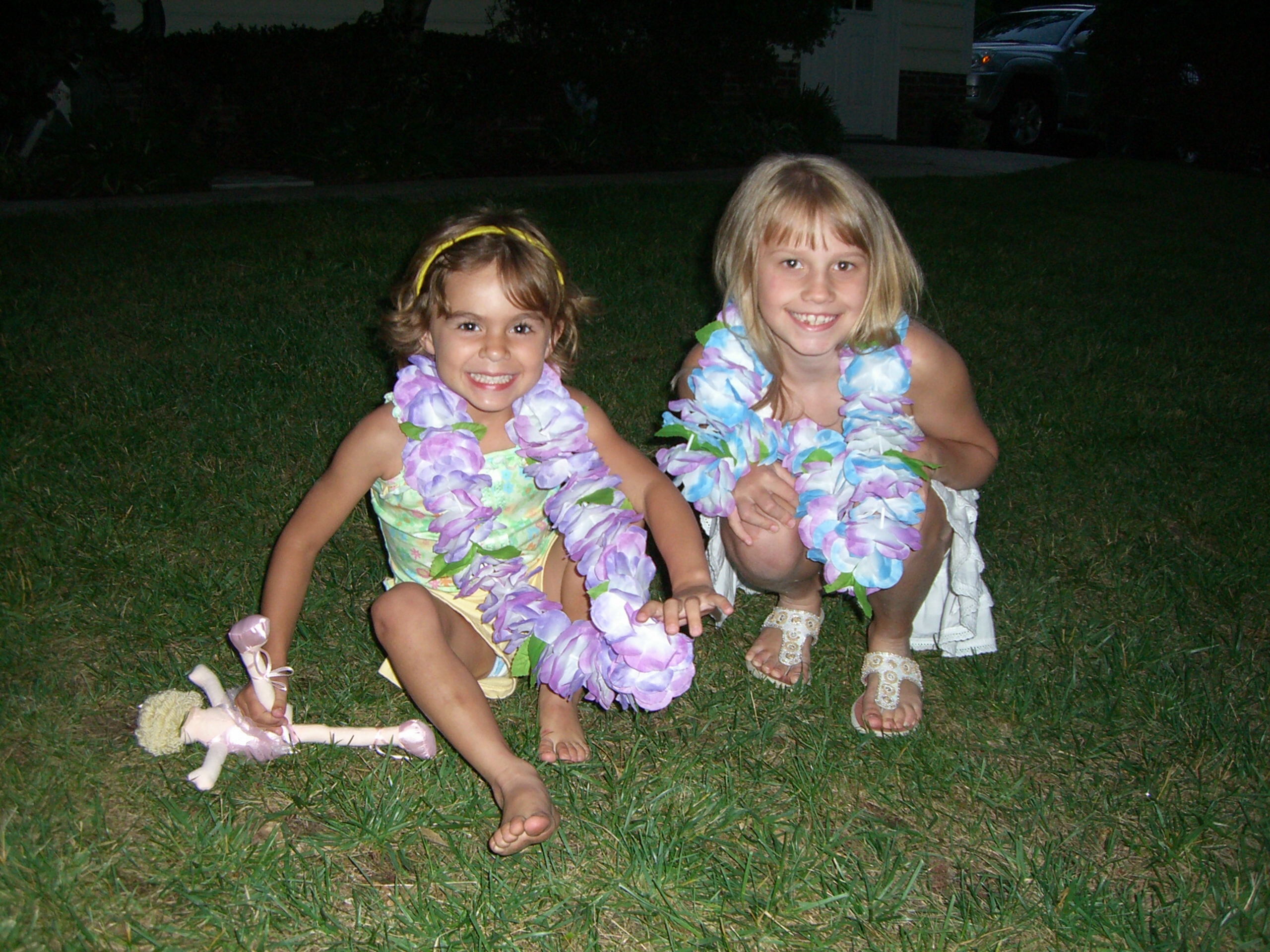 Taylor and Morgan in leis